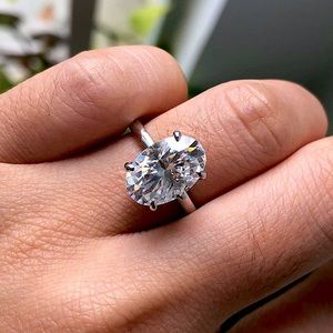 3 Carat Moissanite diamond ring in Size 6 and in 10K white Gold.